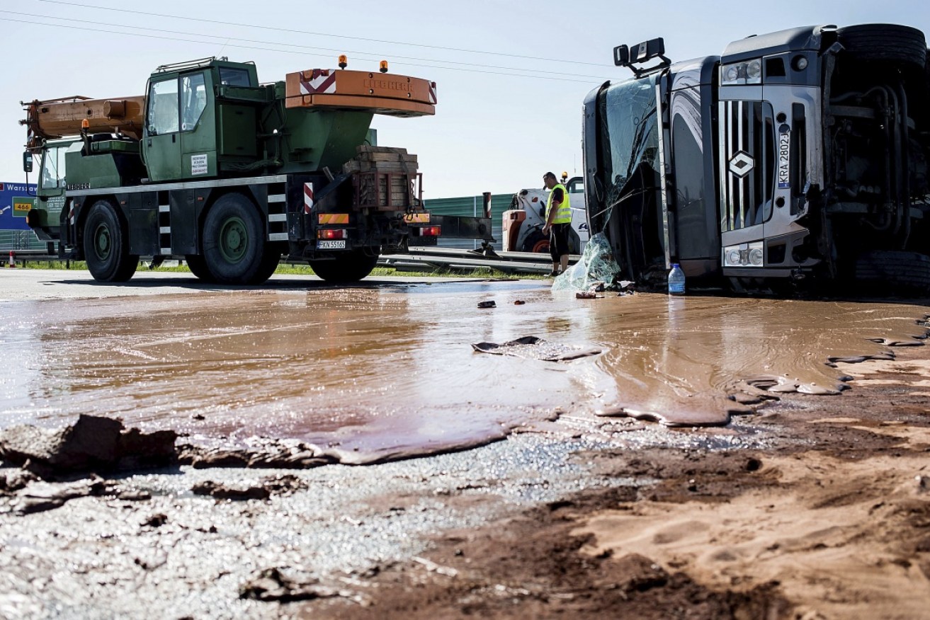 Tons of liquid milk chocolate on the road after the spill in Poland. 