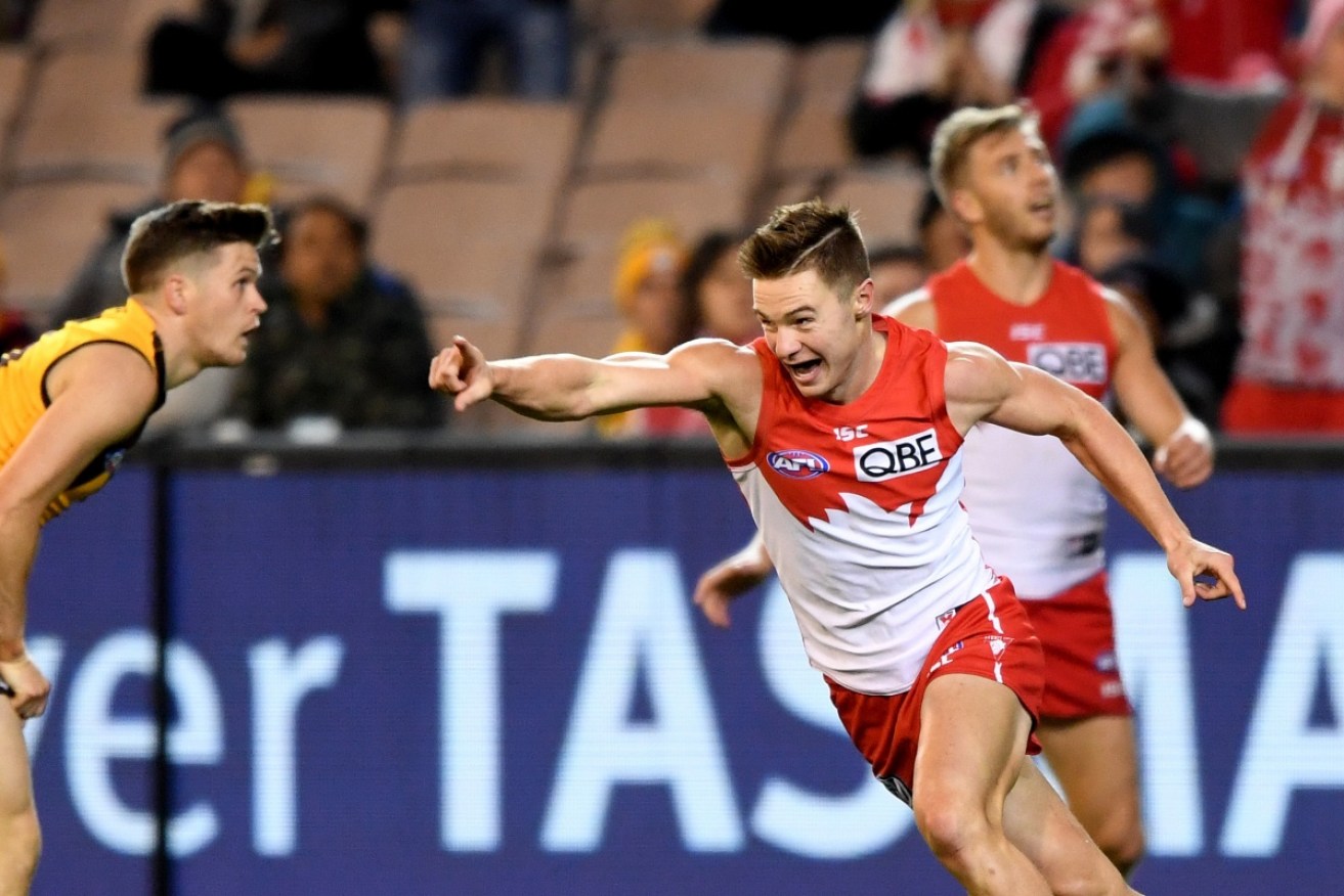 The 'fast and agile' forward, who played his first game at the MCG on Friday night, signed with the Swans in the 2017 Rookie Draft.