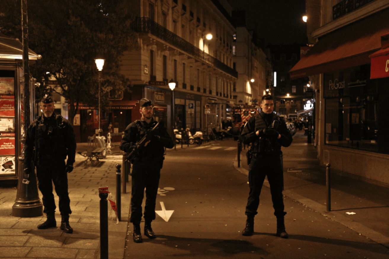 Heavily armed gendarmes seal the street where the attacker claimed one life before being shot dead.