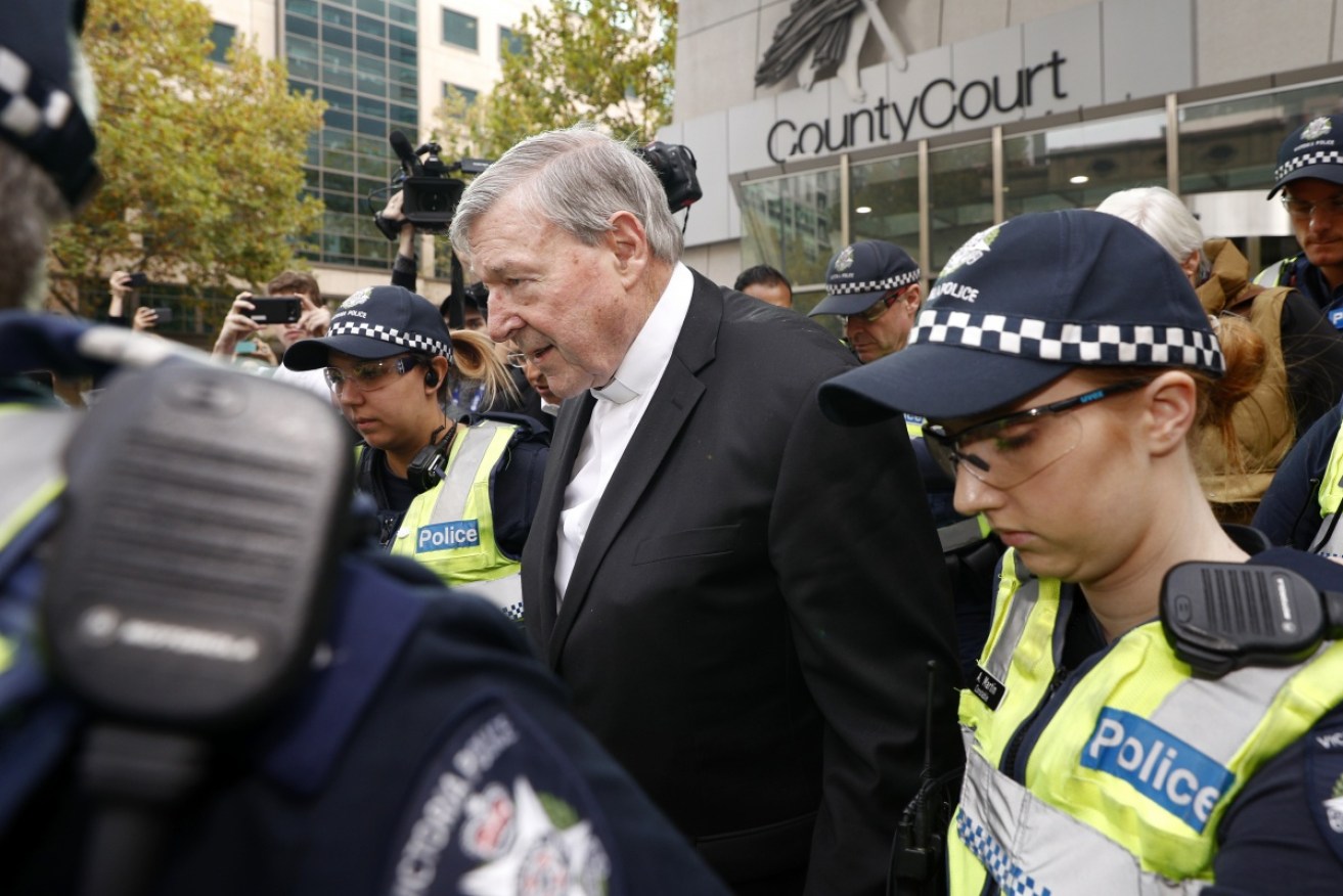 George Pell leaves Victoria's County Court after an earlier hearing.