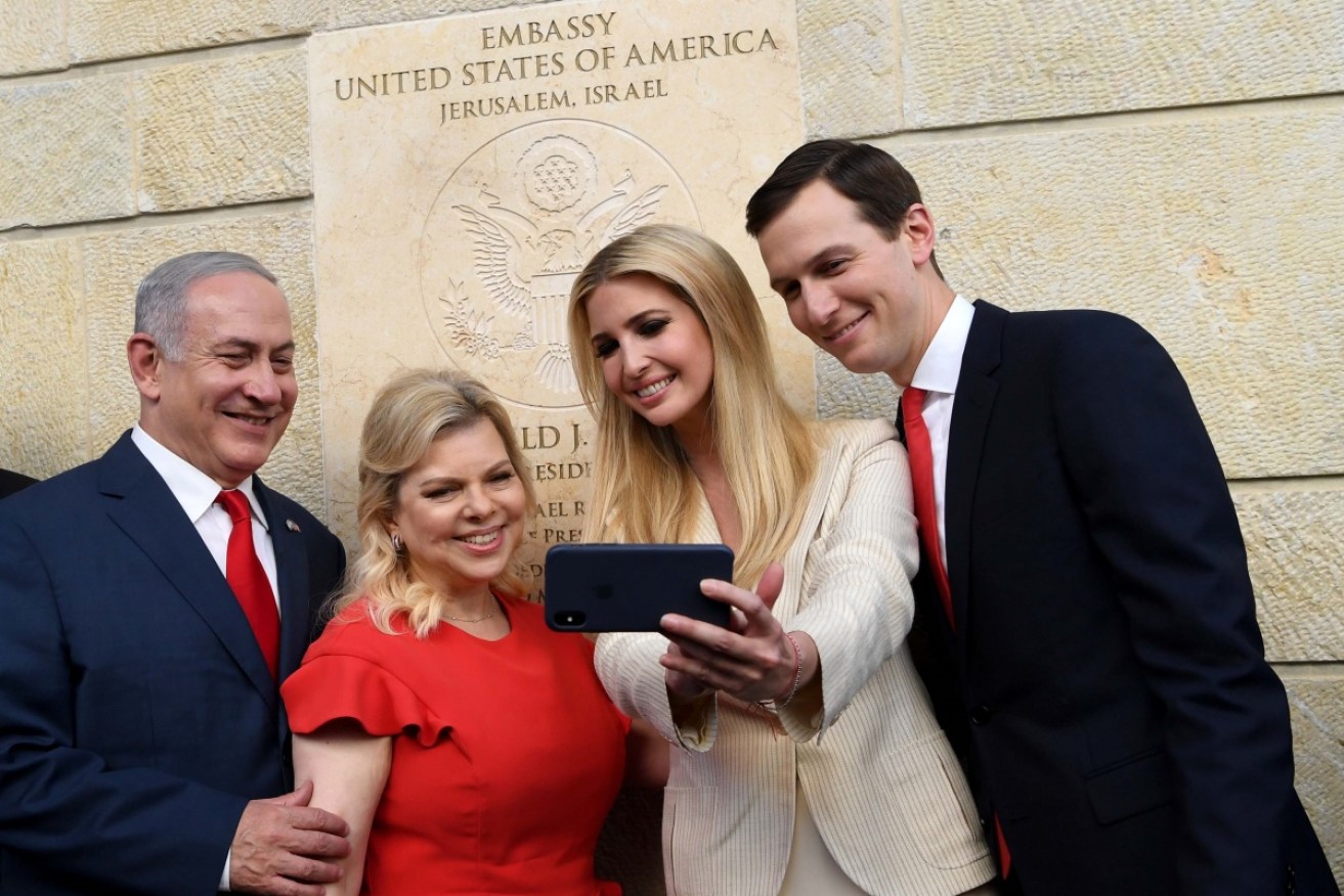 Ivanka Trump and Jared Kushner pose outside the new US embassy with Israeli Prime Minister Benjamin Netanyau and his wife.