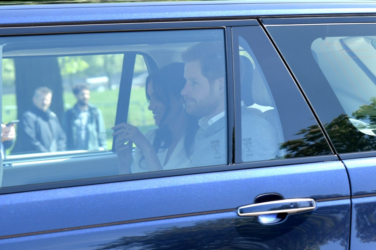Prince Harry and Meghan Markle arrive for wedding rehearsals ahead of their wedding on Saturday.