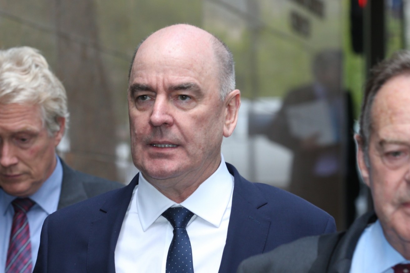 Darrell Fraser, the former deputy secretary of the education department, has been charged by IBAC.