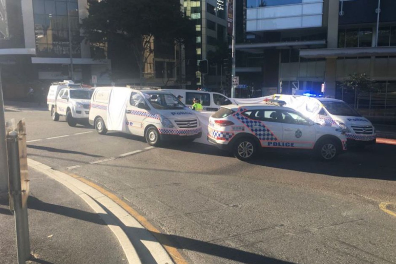 A woman was hit and killed by a bus in the Brisbane CBD on Tuesday morning.