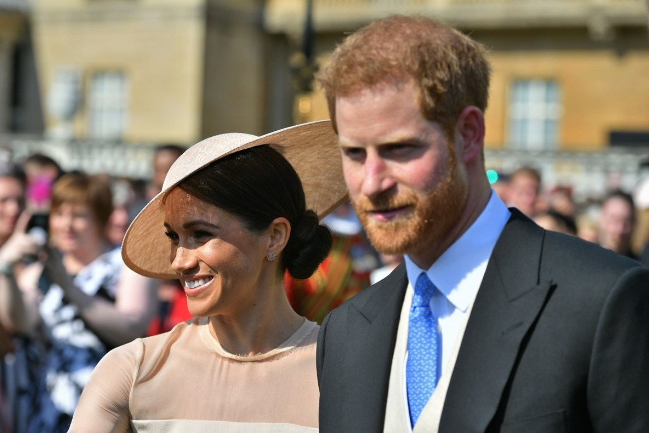 Prince Harry and Meghan Markle have made their first appearance as a married couple at a garden party.