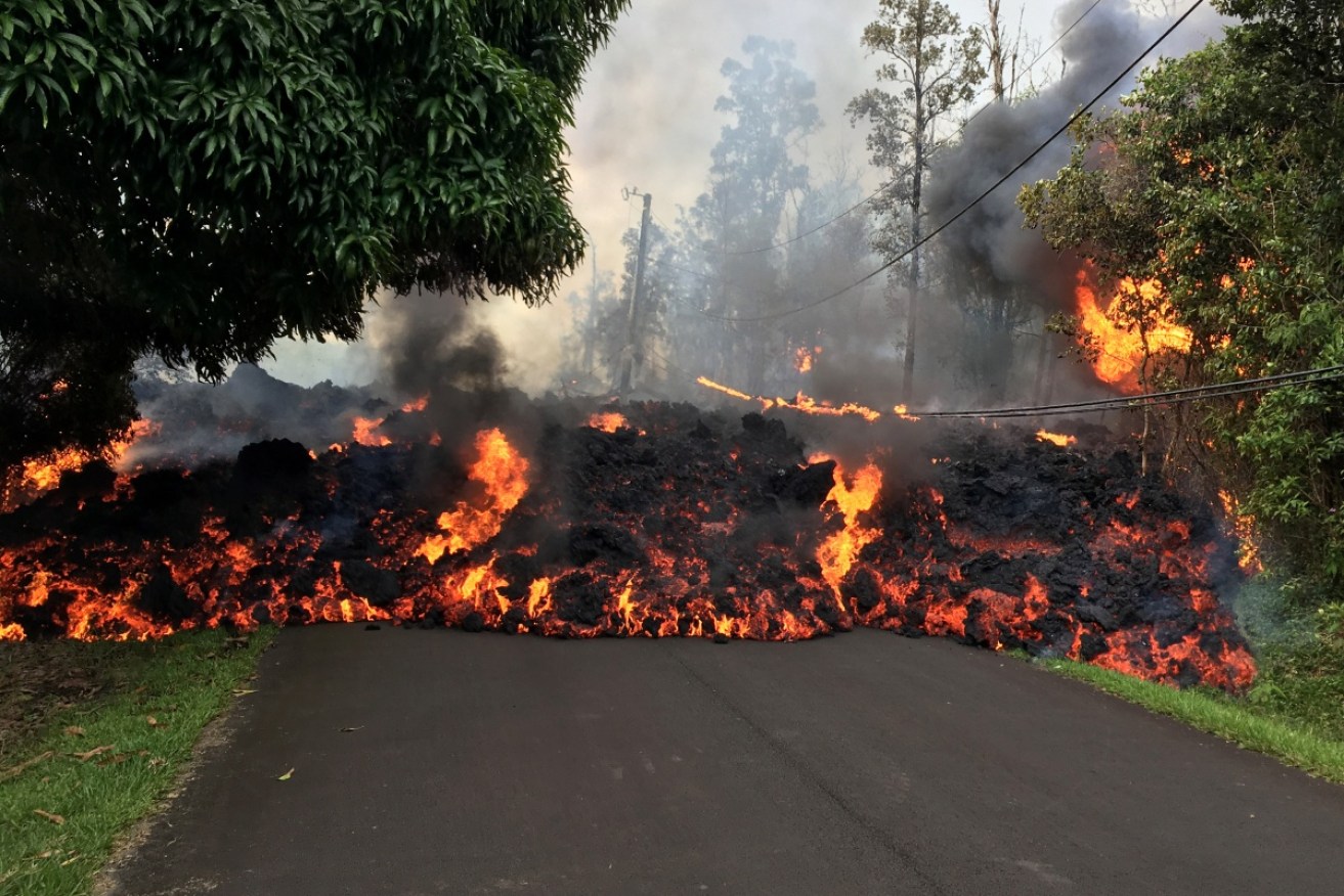 U.S. Geological Survey took this image of lava flow moving down a road in the Puna area of the 'Big Island'.