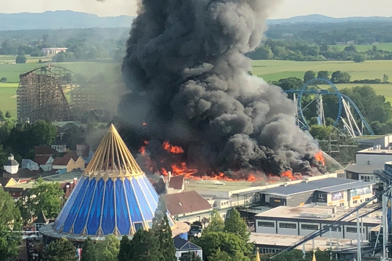 The blaze destroyed part of the theme park, which re-opened on Sunday.