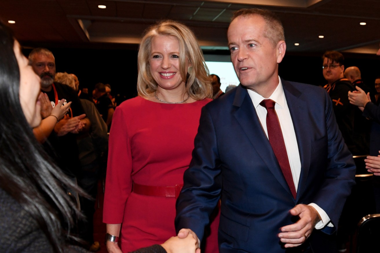 Mr Shorten and wife Chloe leave the Victorian Labor state conference at Moonee Valley Racecourse on Sunday.