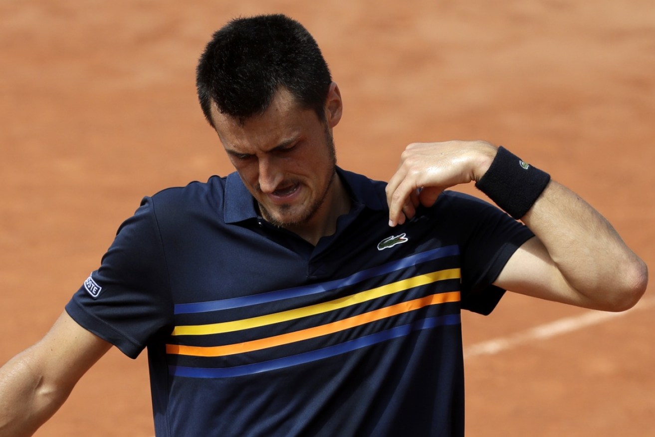 Bernard Tomic bowed out in the first round at Roland Garros on Monday night. 