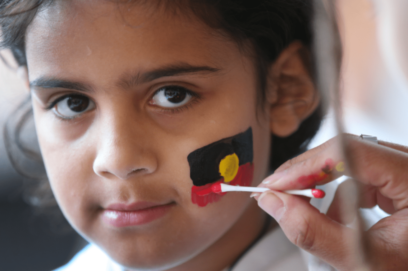 A girl gets her face painted for the 14th annual Long Walk in Melbourne.