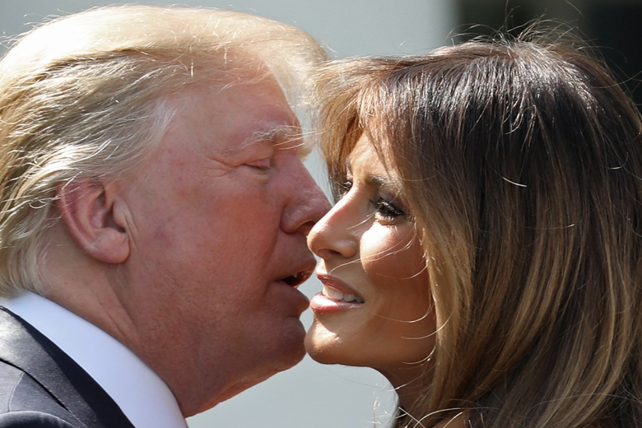 President Donald Trump kisses his wife Melania Trump at the May 7 launch of her Be Best initiative.