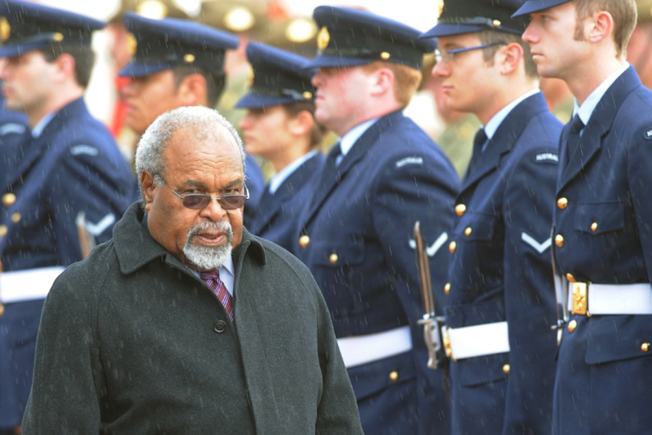 Sir Michael Somare arrives at Parliament House in Canberra in 2009.