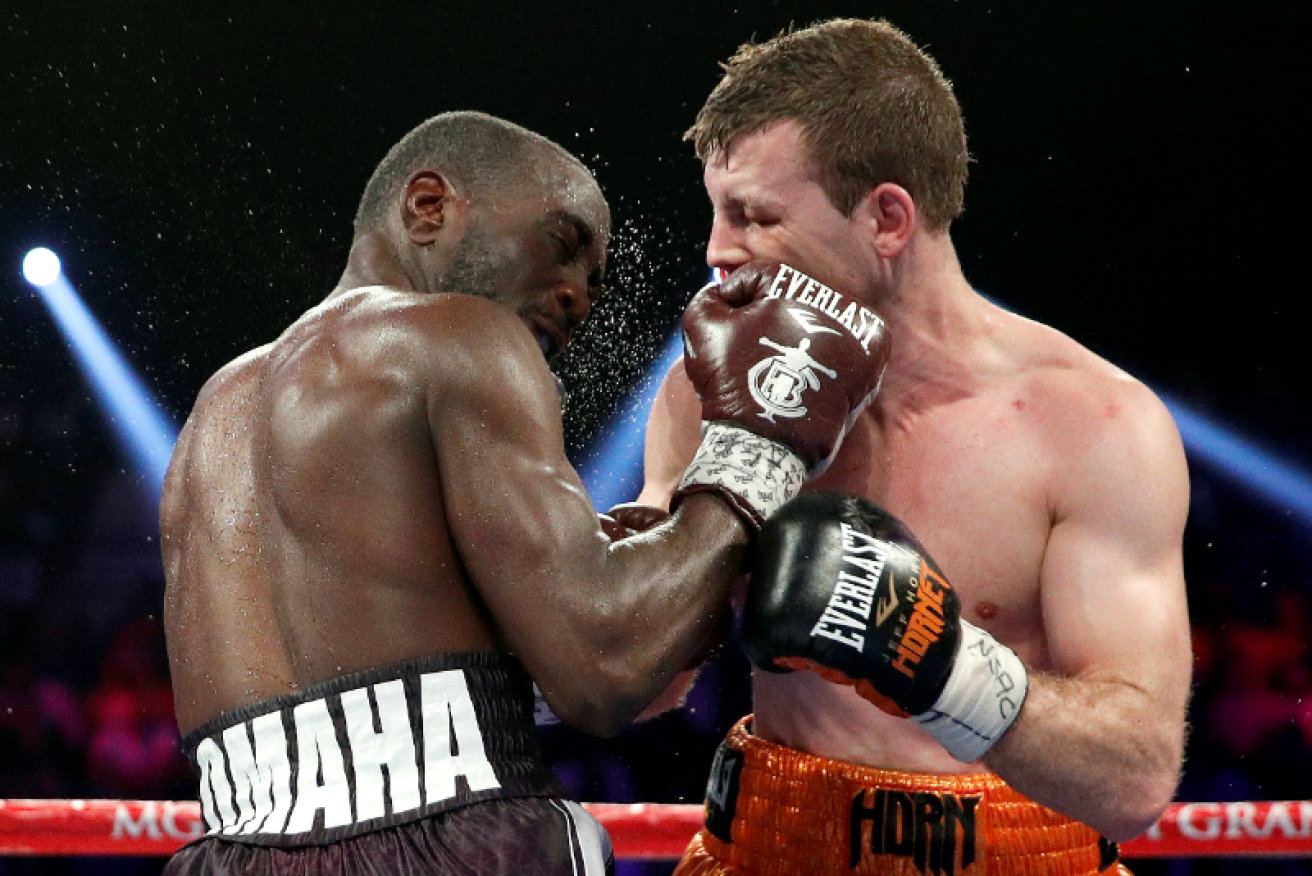 Jeff Horn absorbs another punishing uppercut from Terence Crawford in Las Vegas. 
