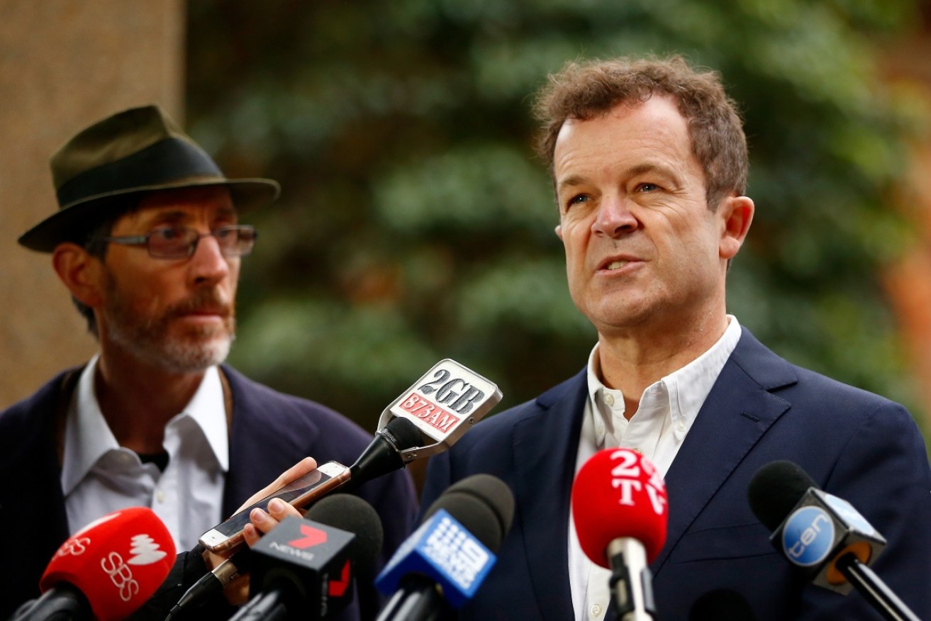 NSW Attorney General Mark Speakman (right) announced the reforms on Sunday with abuse survivor John Ellis (left).
