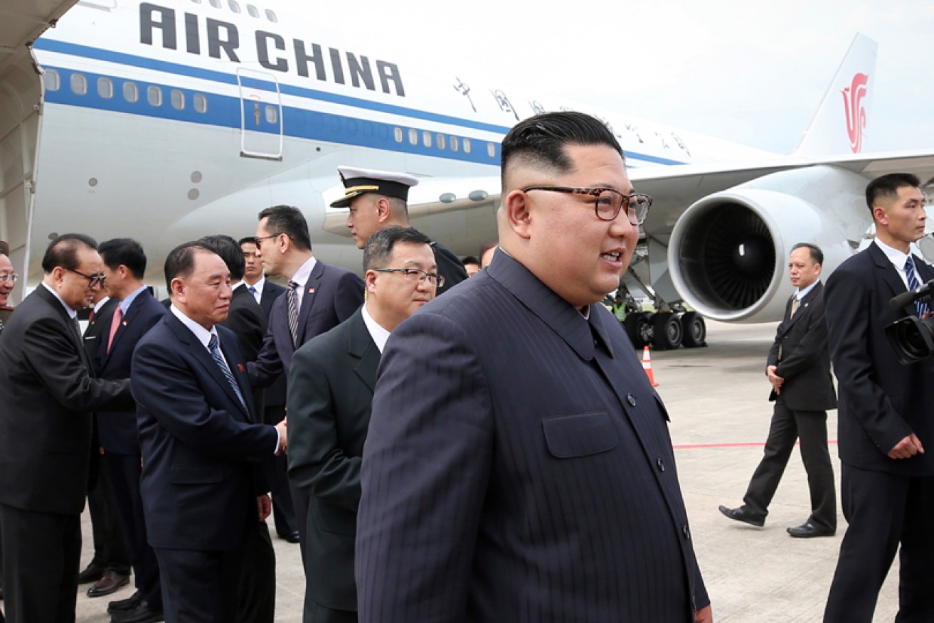 North Korean leader Kim Jong-un arrives at the Changi International Airport on Sunday. 