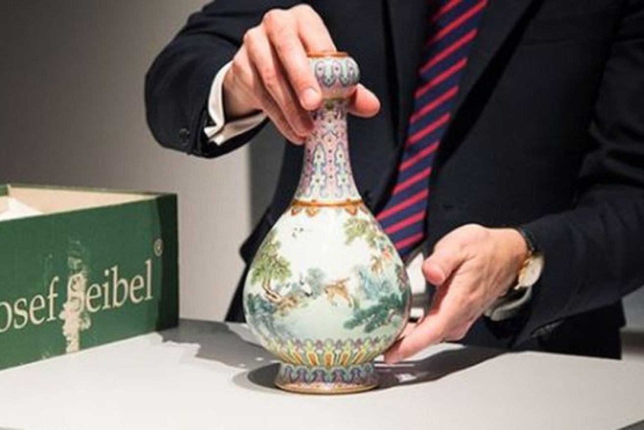 The centuries old Chinese vase was stored in an attic for decades.