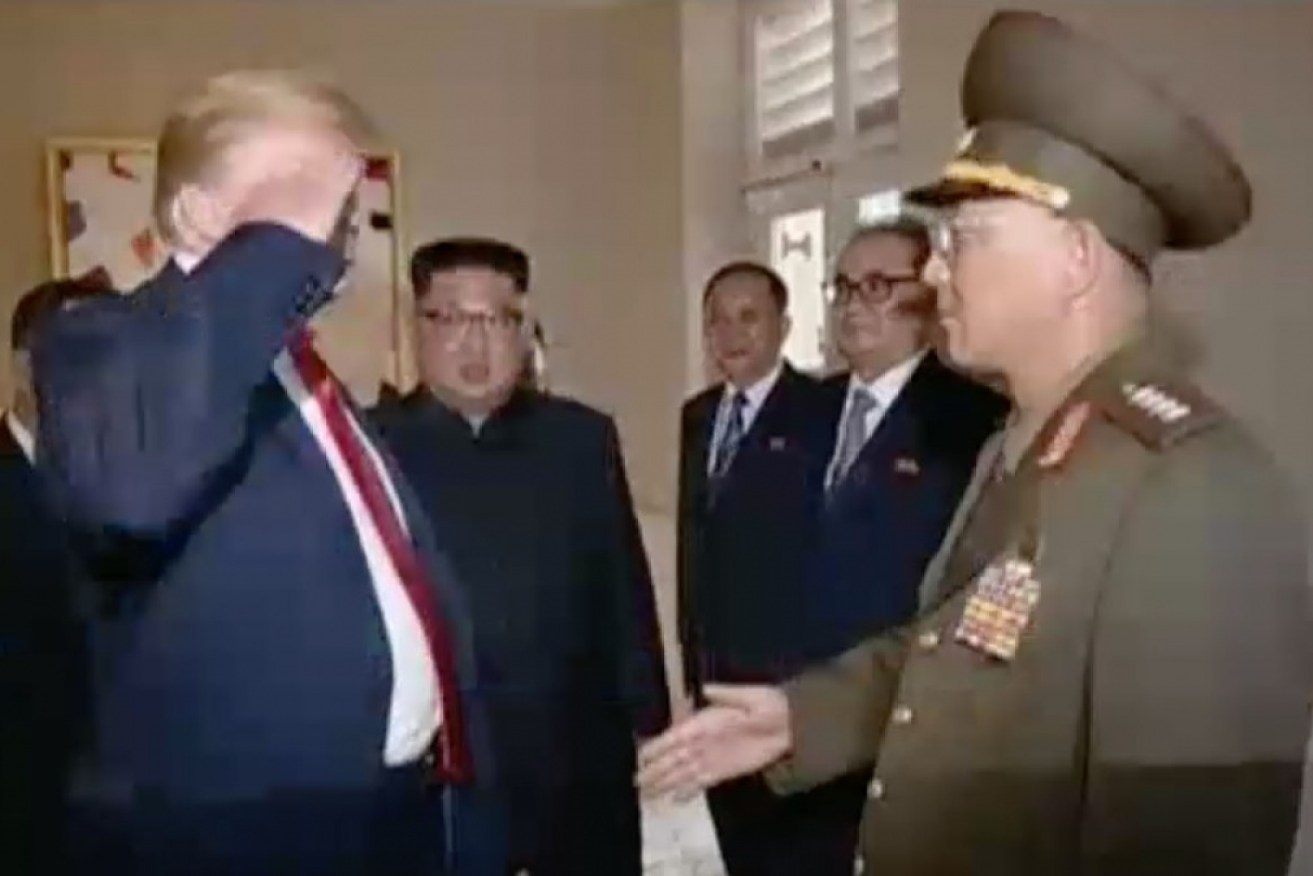 North Korean TV highlight awkward handshake between Donald Trump and top general.