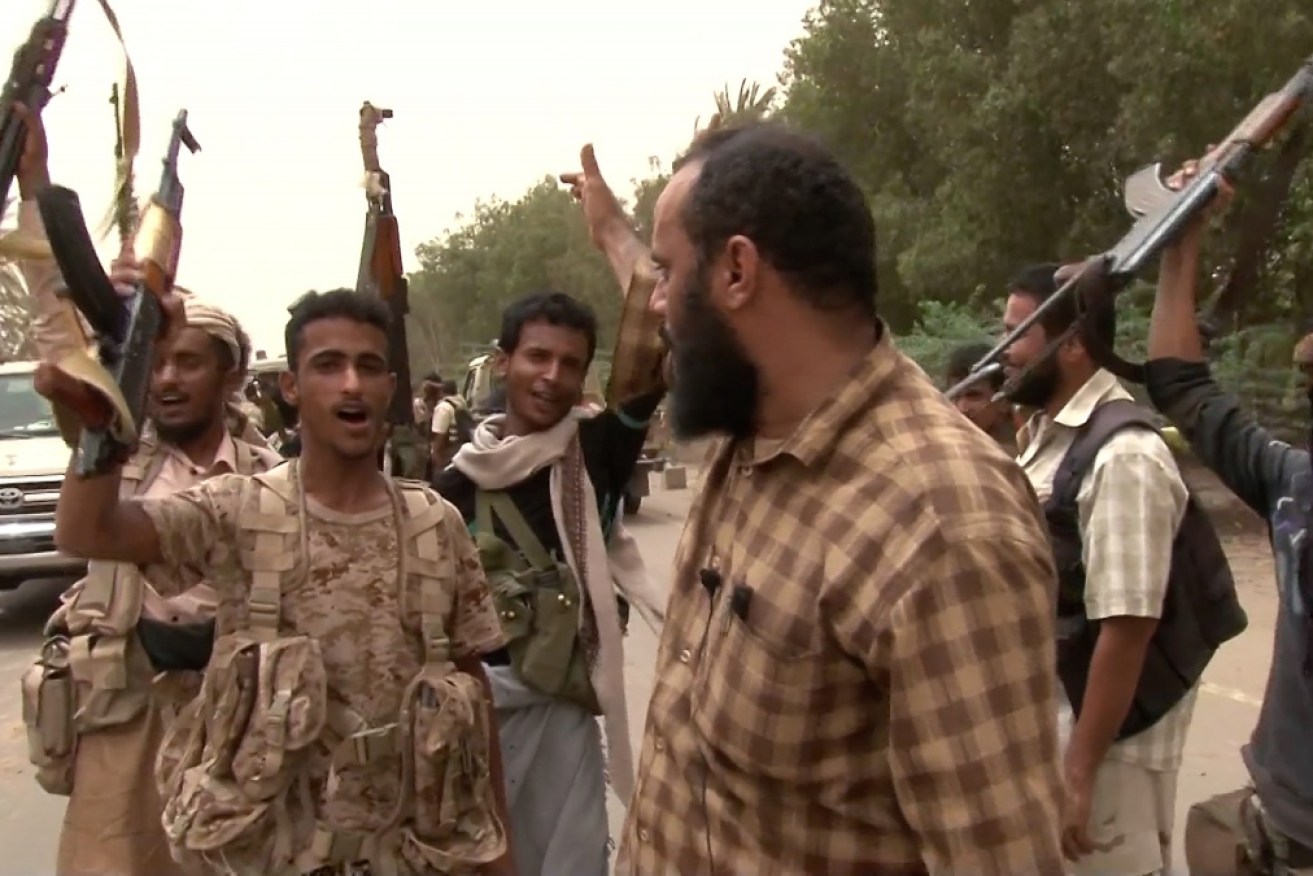 Yemeni pro-government forces gathering at the south of Hodeida airport, in Yemen's Hodeida province on June 15.