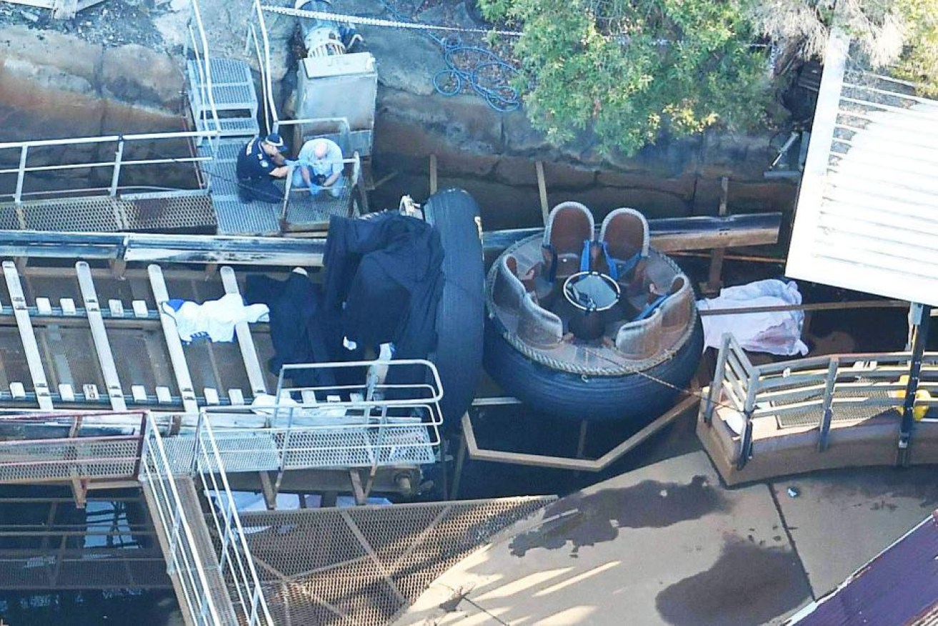 Investigators study the Thunder River Rapids ride after the 2016 accident. 
