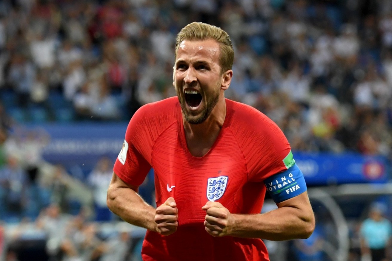 Harry Kane celebrates scoring the winner for England in the first minute of injury time.