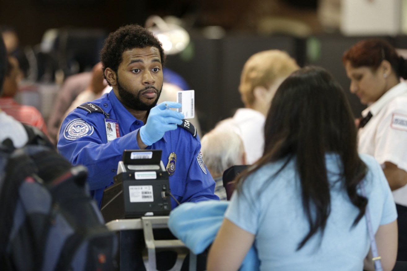 Airport screening, such as this 2016 check in New York,  has led to fears of racial profiling in Australia.