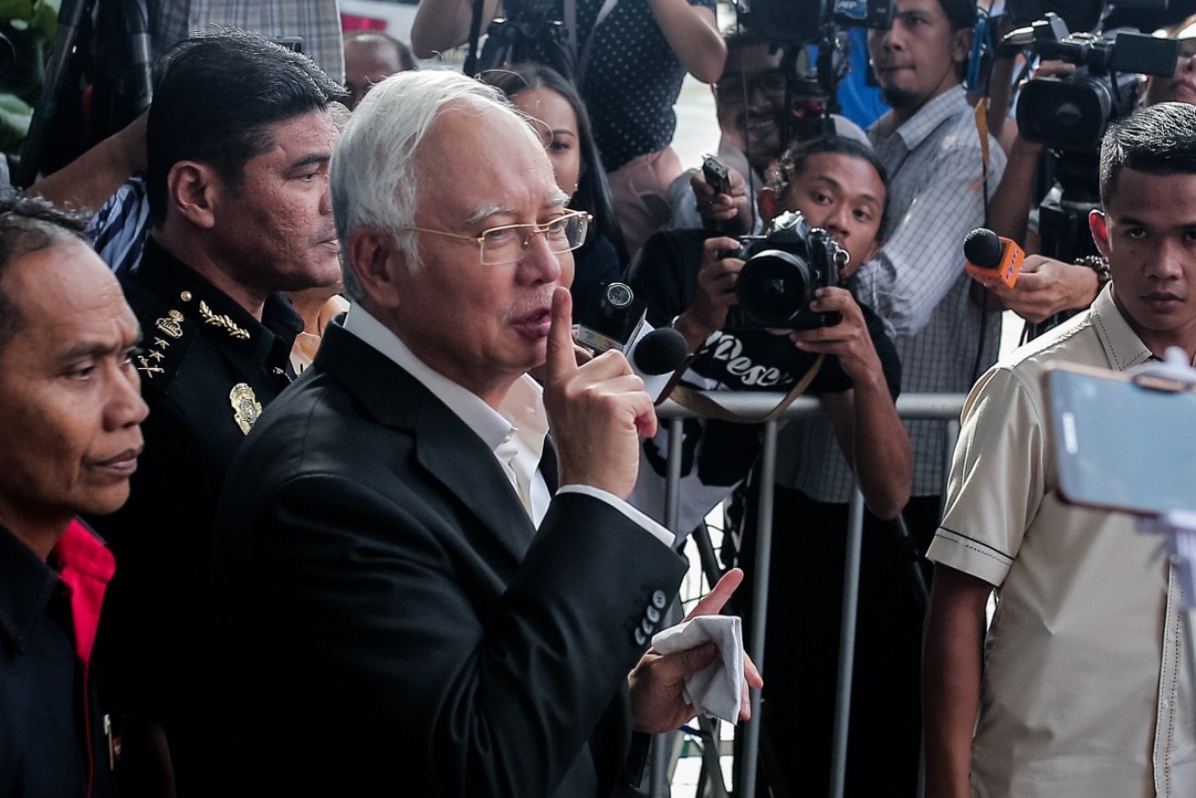 Malaysia's former prime minister Najib Razak speaks to the media after being questioned at the Malaysian Anti-Corruption Commission (MACC) office in Putrajaya on May 24.