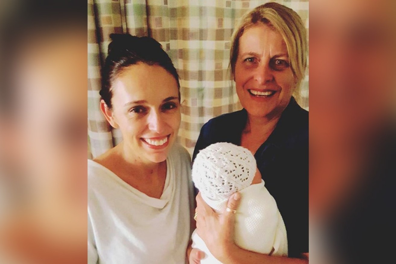 Jacinda Ardern with her new baby and midwife Libby.