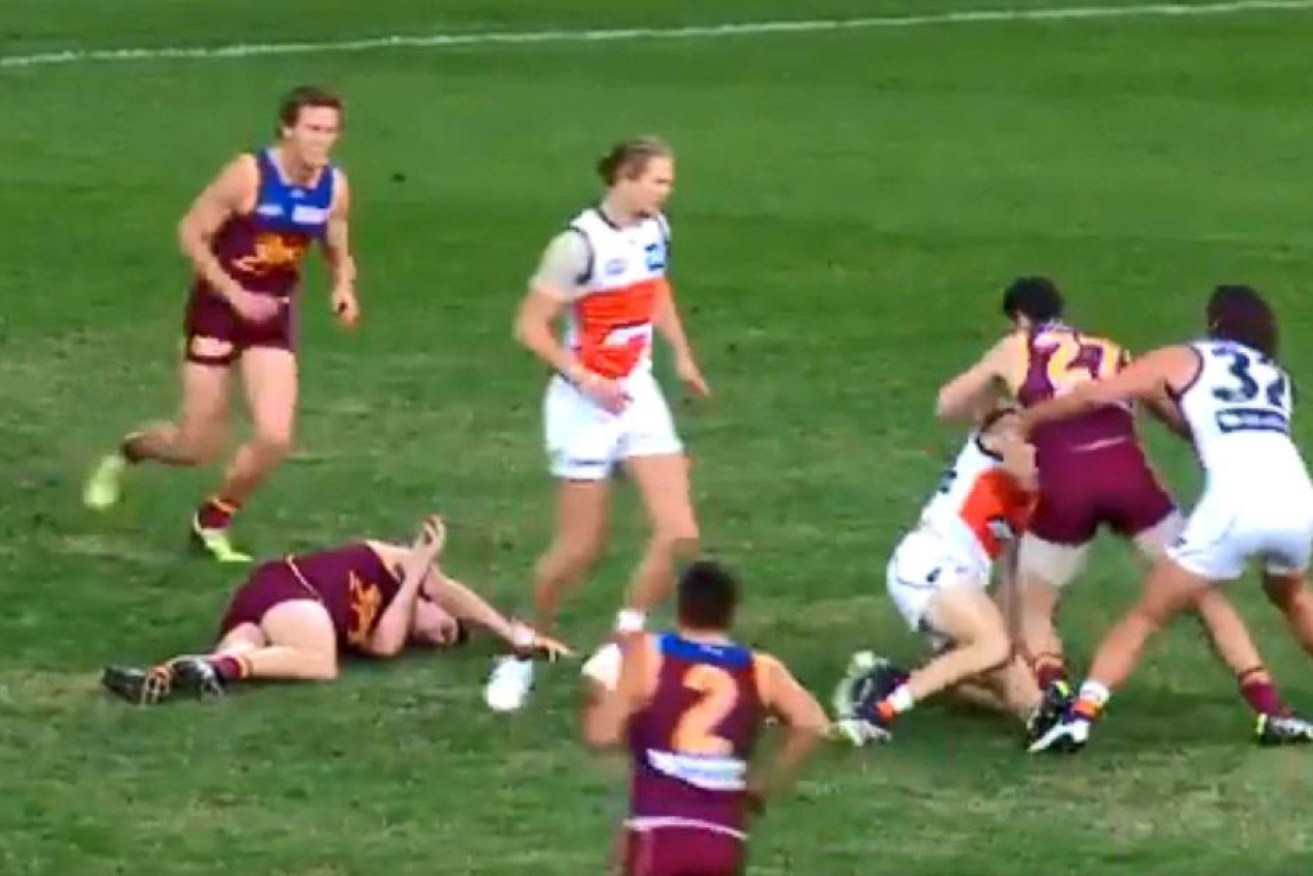 Lions defender Harris Andrews was out before he hit the ground after a mid-air collision with Jeremy Cameron.