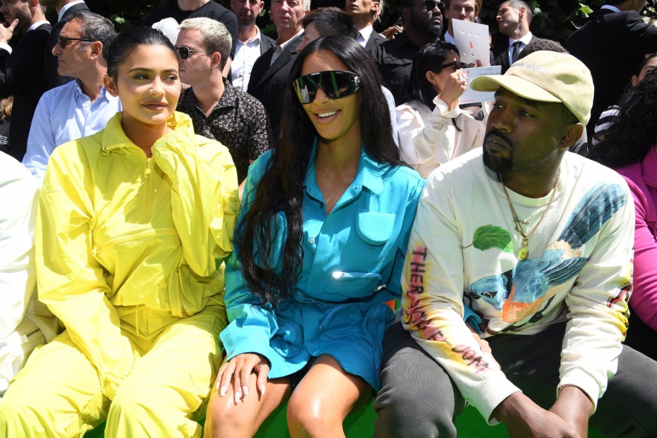Homage to the 1990s parachute tracksuit: Kylie Jenner, Kim Kardashian and Kanye West at the Louis Vuitton show on June 21. 