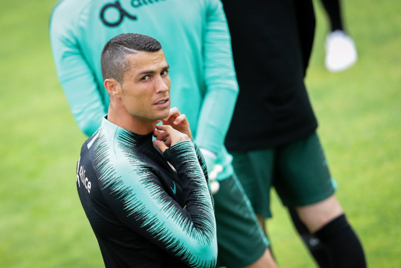 Cristiano Ronaldo denies the rape allegation as Juventus says he will retain his place in the team.