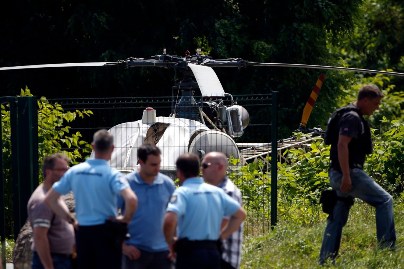 A man is being hunted by police in northern France after staging a dramatic escape from prison using a helicopter.