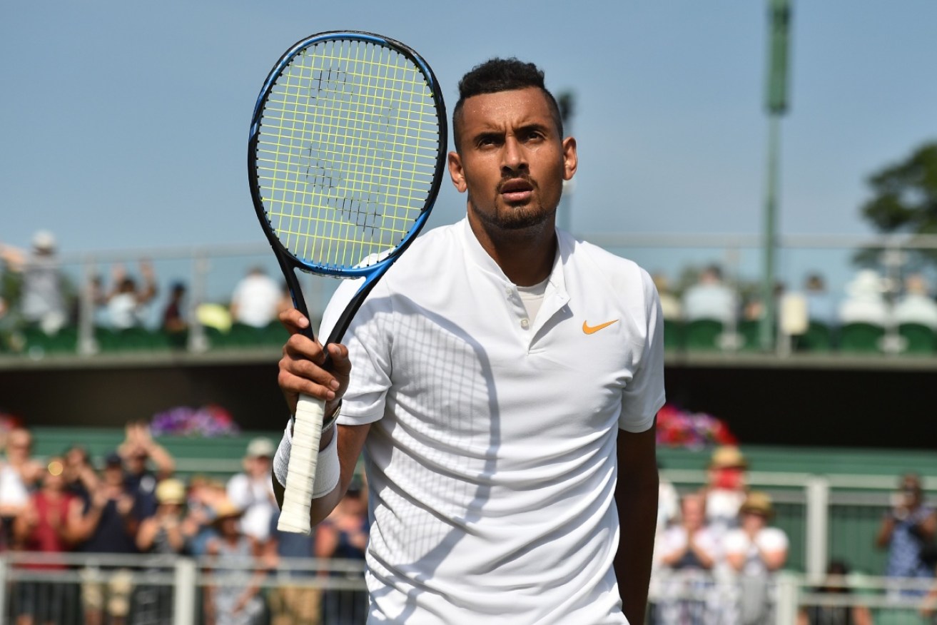 Nick Kyrgios has continued his impressive grass-court run with a four-set first-round Wimbledon win over Denis Istomin.
