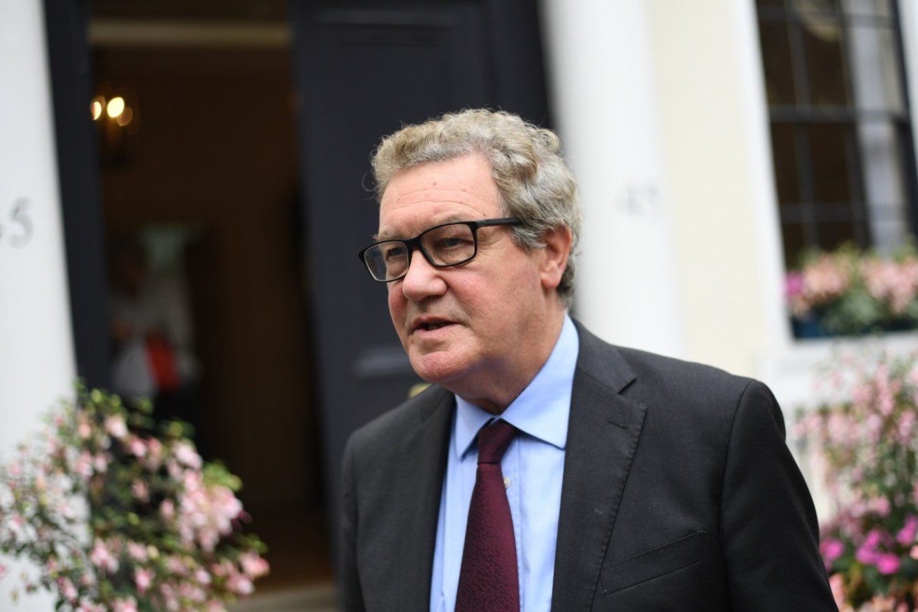 Alexander Downer was reportedly told Russia had political dirt on then presidential frontrunner Hillary Clinton.