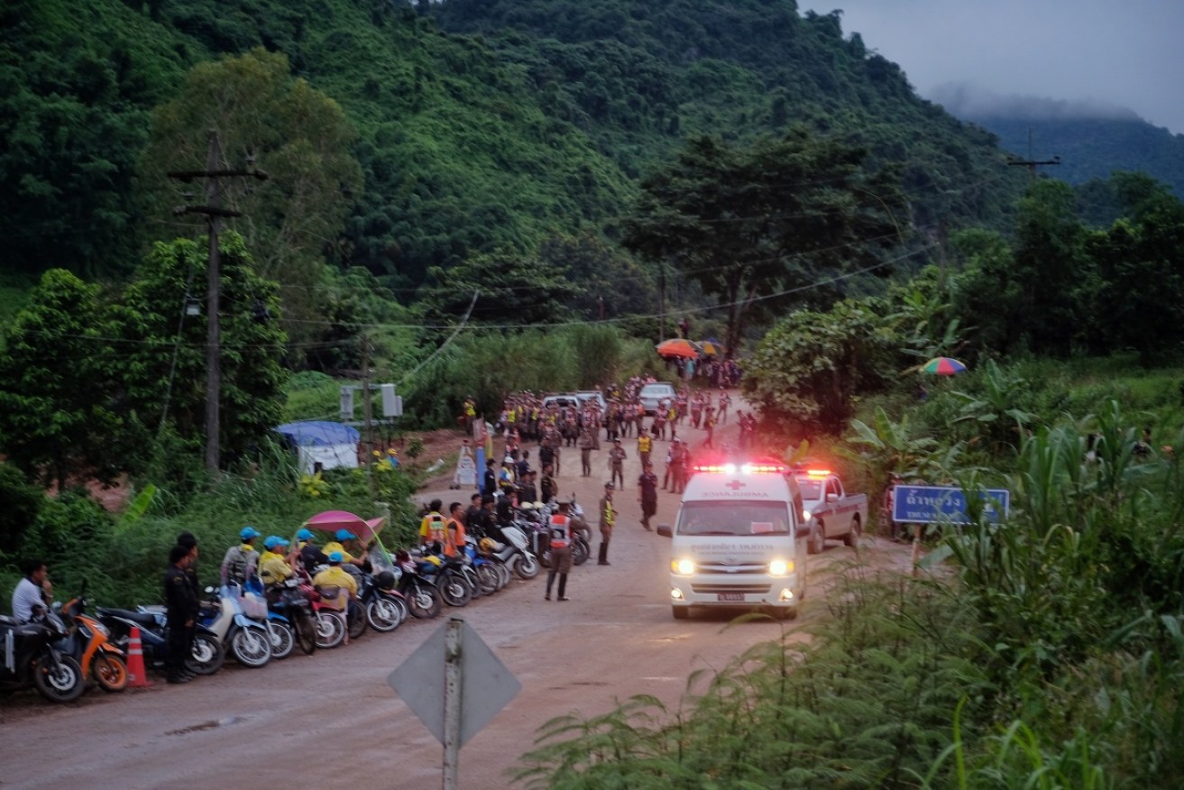 An ambulance leaves the site of the rescue efforts. 