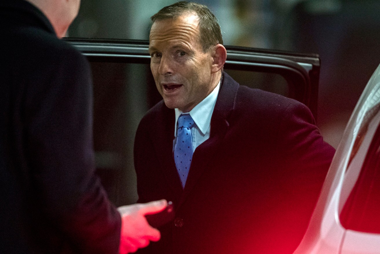 The former PM arrives at a climate change event in Melbourne on July 3.