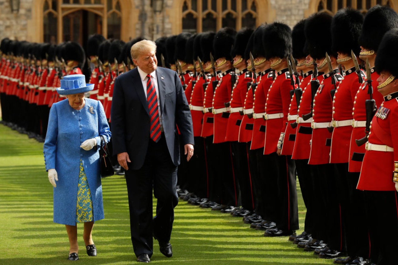 Queen Elizabeth II inspects the Guard of Honour with US President Donald Trump at Windsor Castle.
