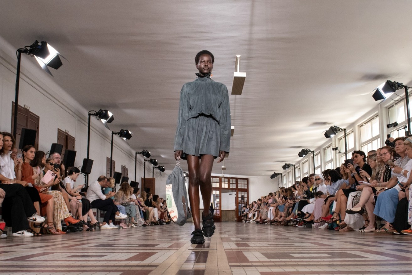 Adut Akech Bior walks the runway for Acne Studios at Paris Fashion Week.