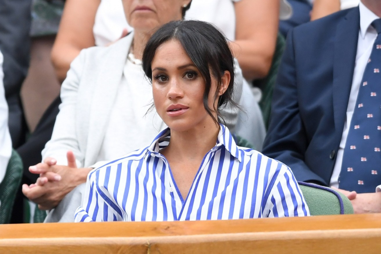 Markle says his daughter has a 'pained smile' since becoming a royal.