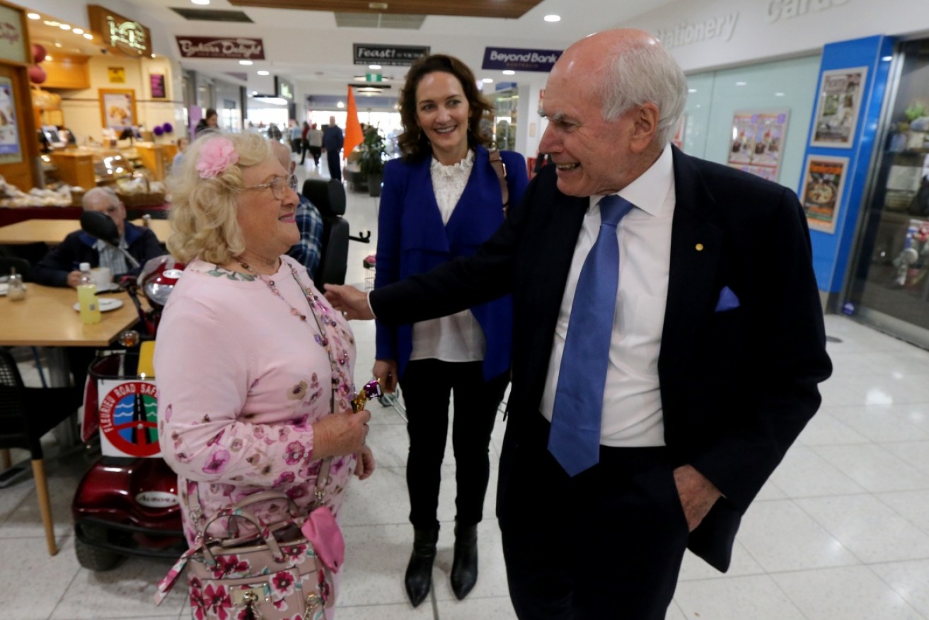 Former PM John Howard campaigns with Mayo candidate Georgina Downer at the Victor Central shopping centre on Wednesday. 