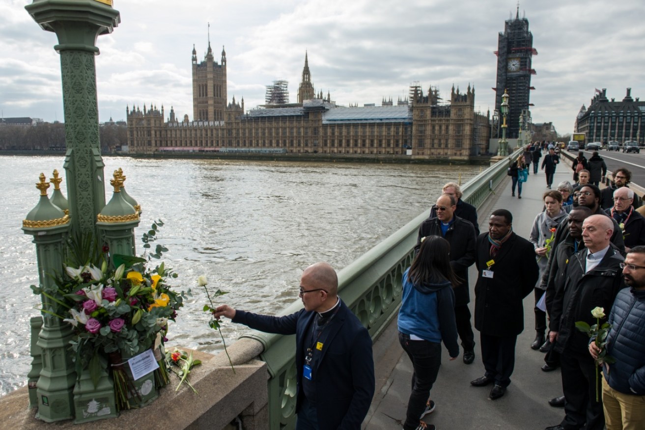 Residents pay their tributes on the first anniversary of the London Bridge attacks in June. 