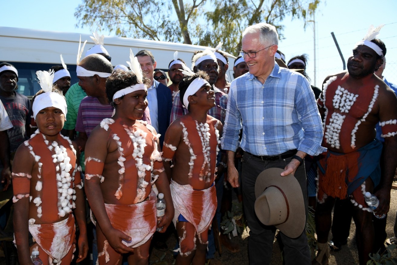 Out and about: Malcolm Turnbull chats to a dance troupe on his visit to Tennant Creek. 