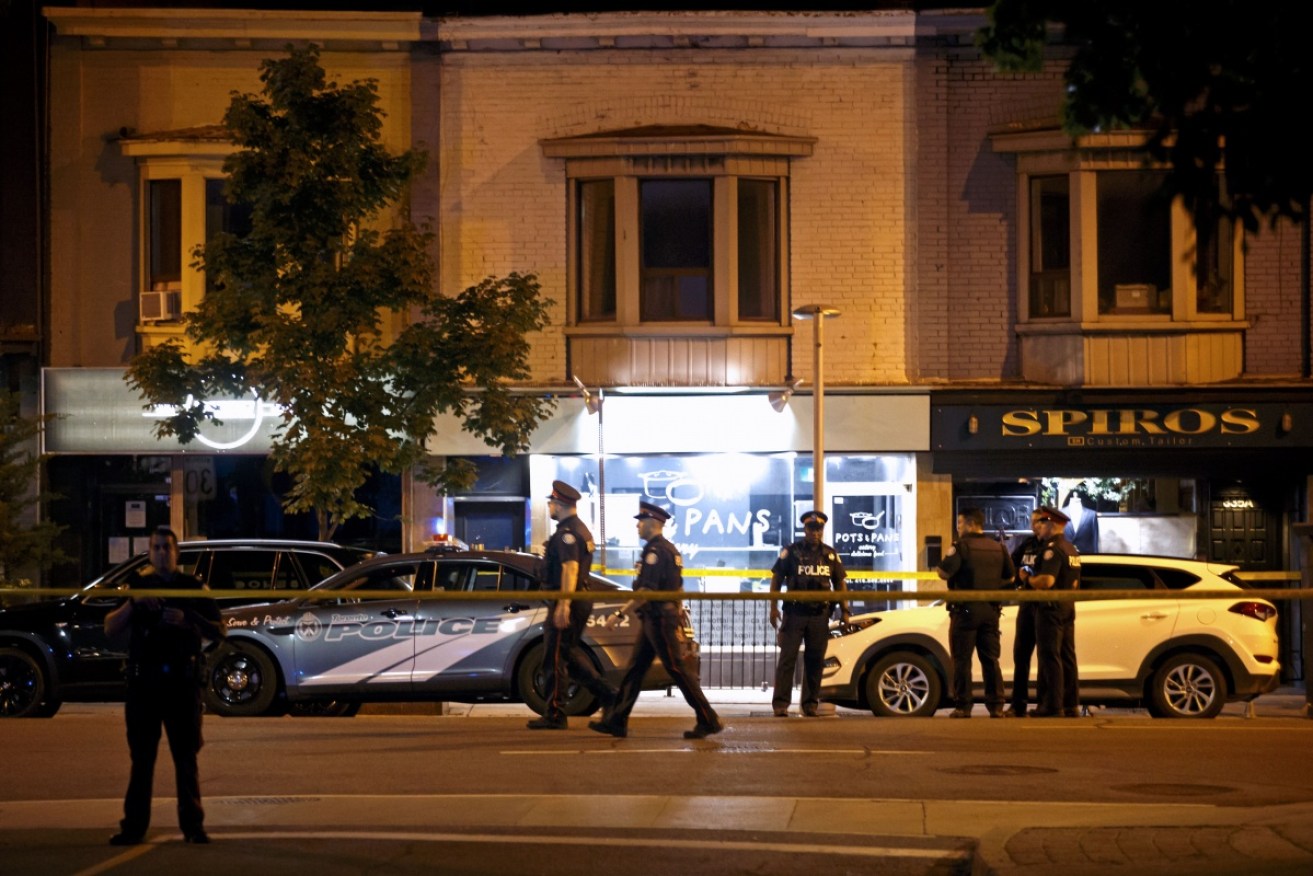 Two young women were killed and 12 more people hurt in a mass shooting in Toronto.