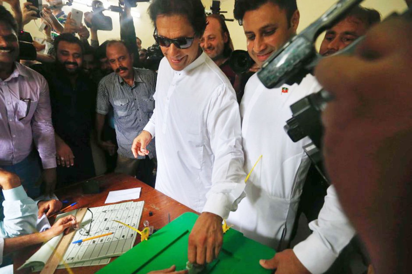 The former cricket captain's party is on track for almost half the seats in Pakistan's parliament.