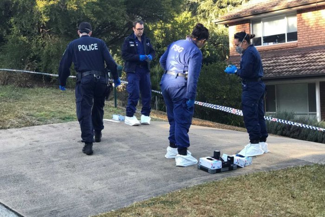 Forensic investigators at the Mount Colah home where Ms Cheah was stabbed on Thursday.