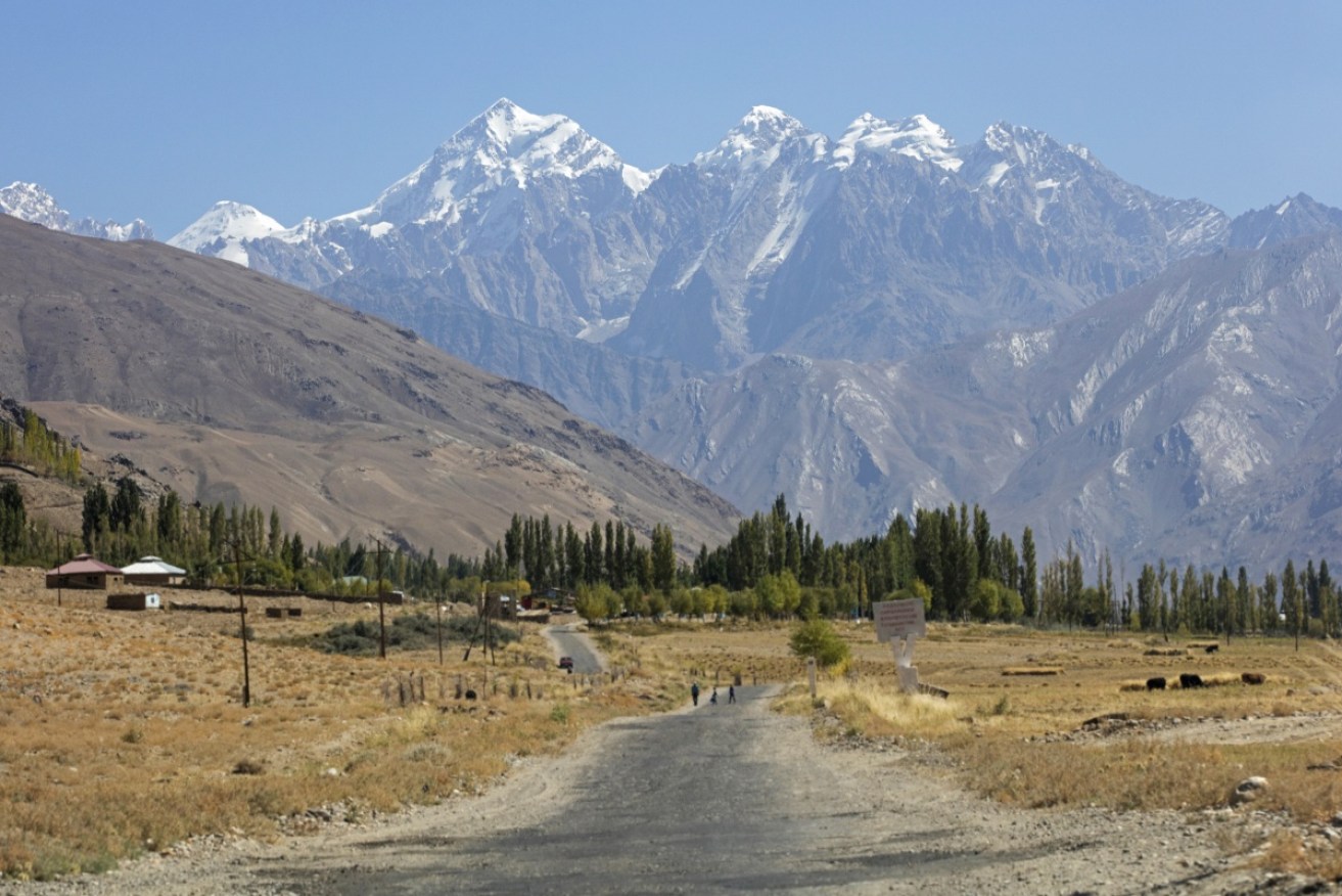 Tajikistani officials say the death of four foreign cyclists may have been an act of terror.