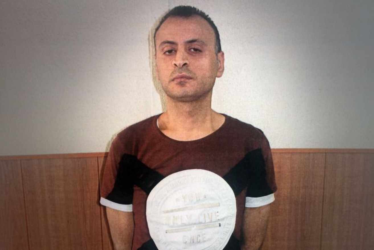 Amer Khayat poses for a mugshot before facing court in Lebanon. 