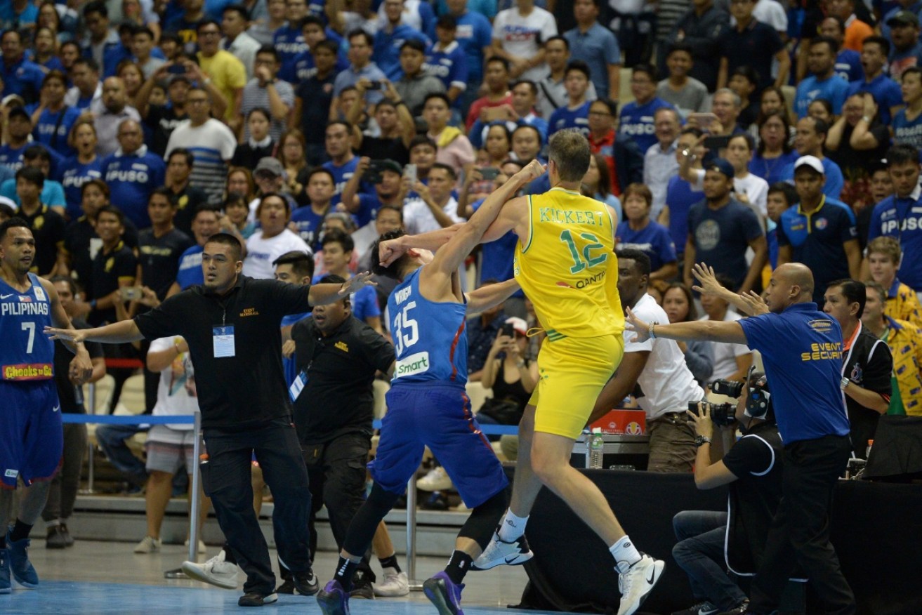 Filipino Mathew Wright takes on Daniel Kickert of Australia in the infamous FIBA World Cup brawl on July 2.