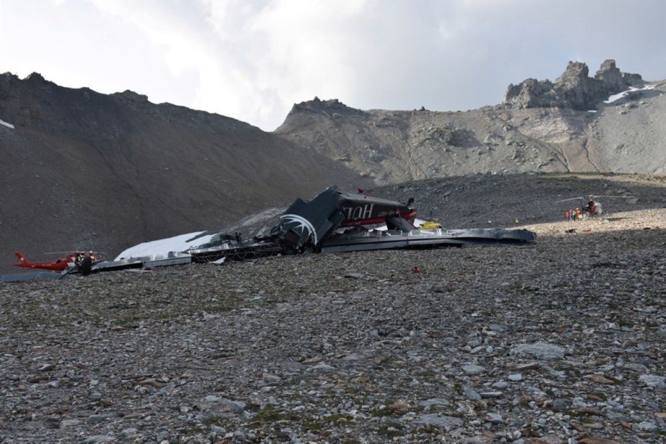 A vintage plane has crashed in the Swiss Alps, killing the 17 tourists and three crew on board.