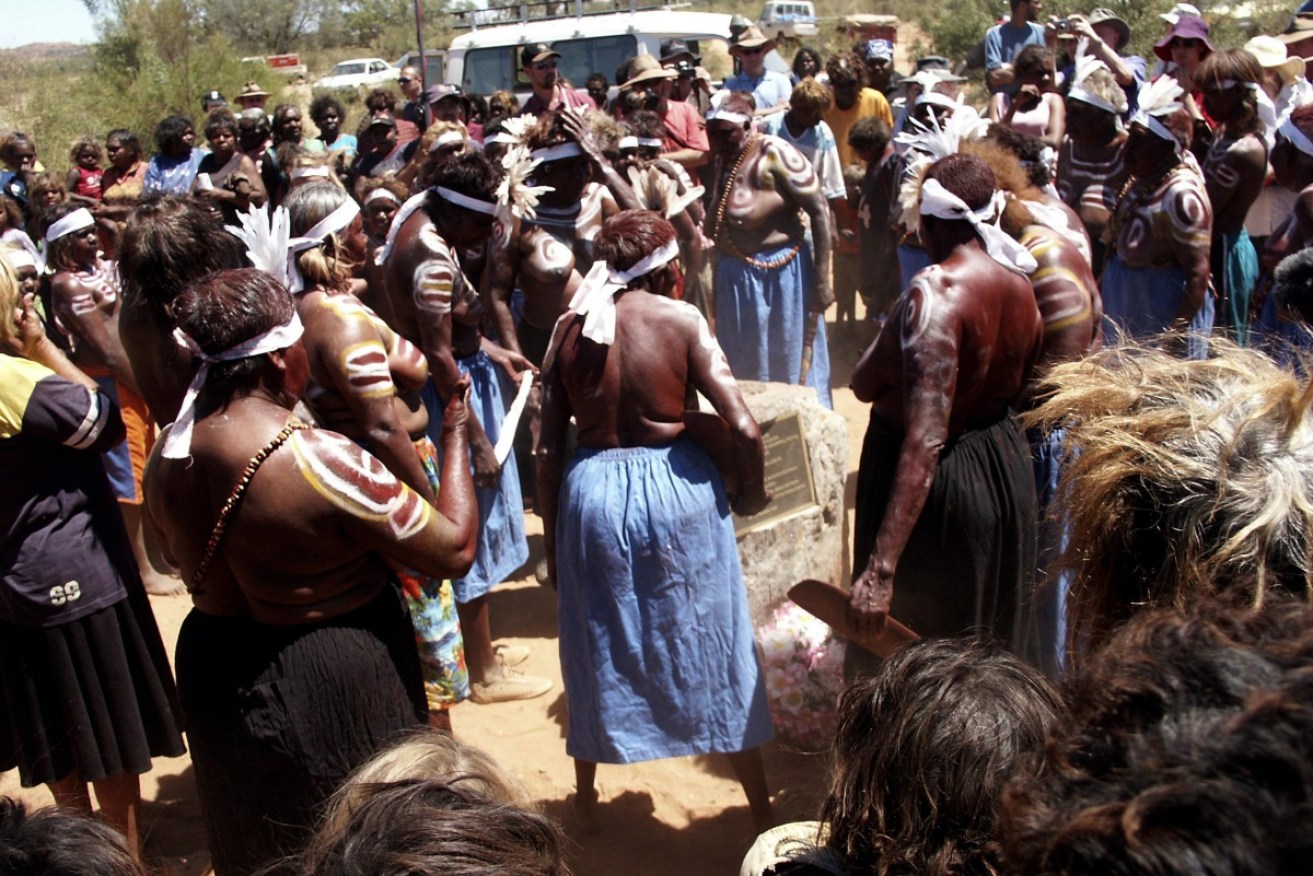 Women perform a traditional dance at the 75th anniversary of the Coniston Massacre at Brooks Soak.