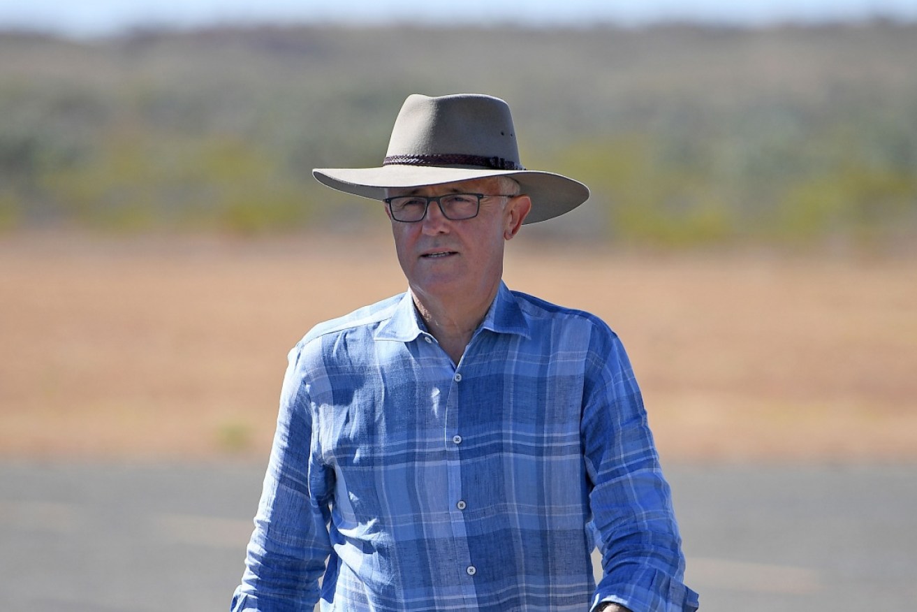 The PM has dismissed suggestions from Barnaby Joyce that Australia's global climate change commitments will not help farmers.
